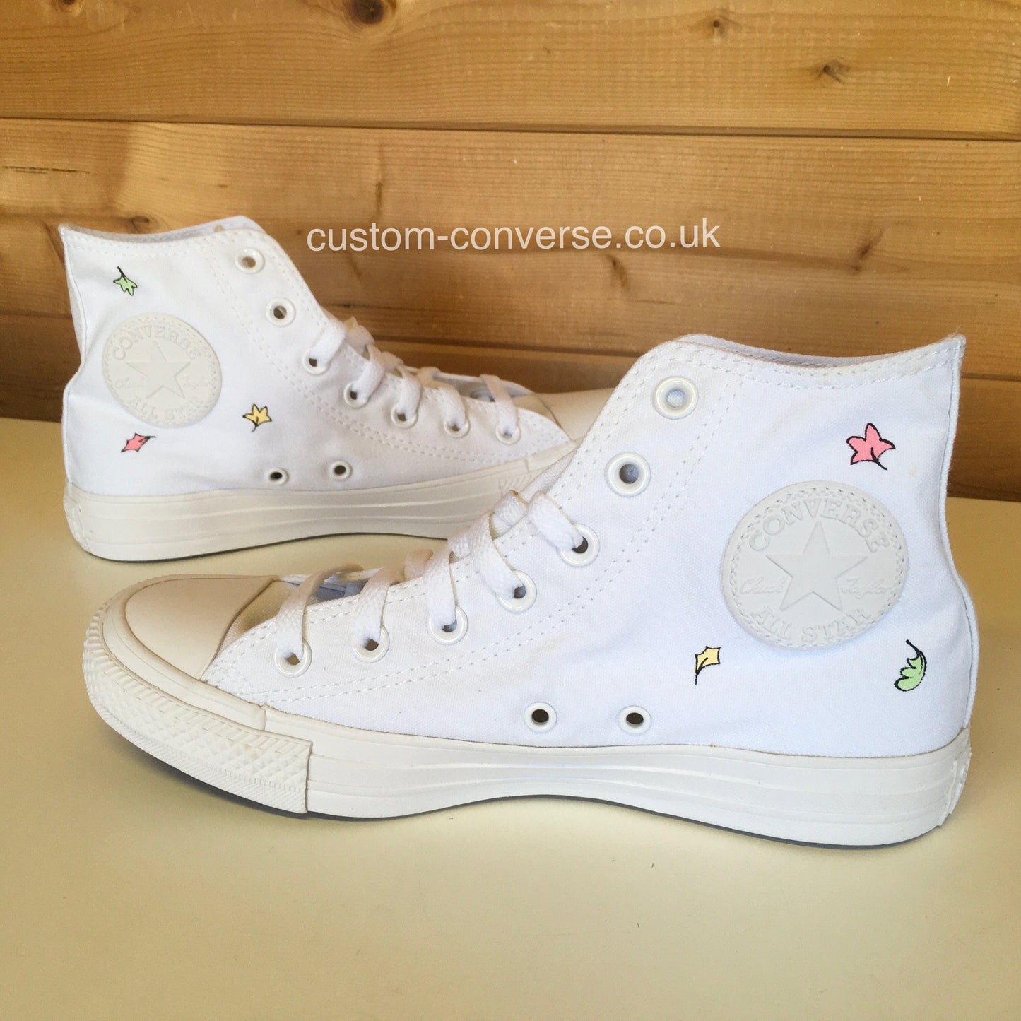 Hand painted Converse with Heartstopper leaf design